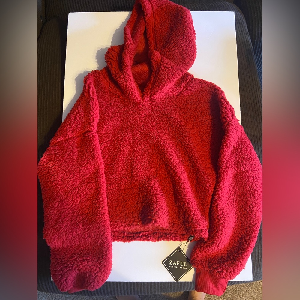 Red hooded fleece top